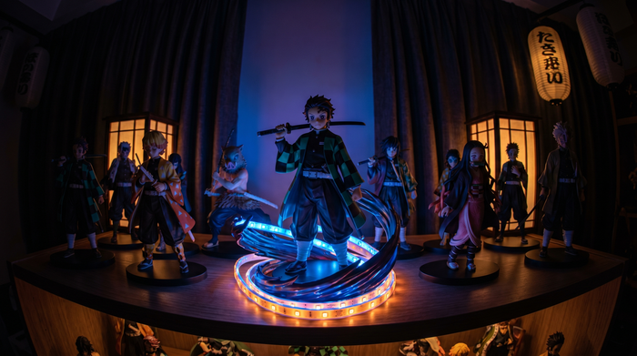 Demon Slayer anime collectible figures on display shelf